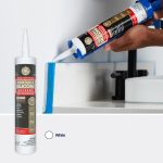 Image of a silicone hybrid sealant being applied to a kitchen counter edge, color option white indicated.