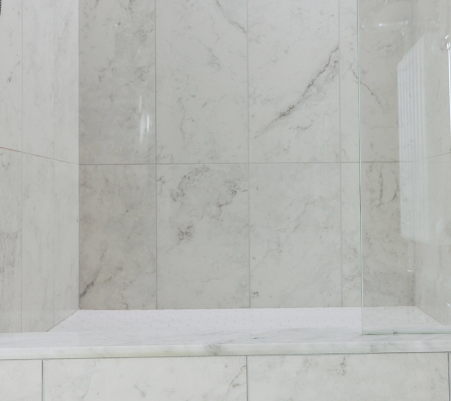 Clean, white grout lines surrounding tile.