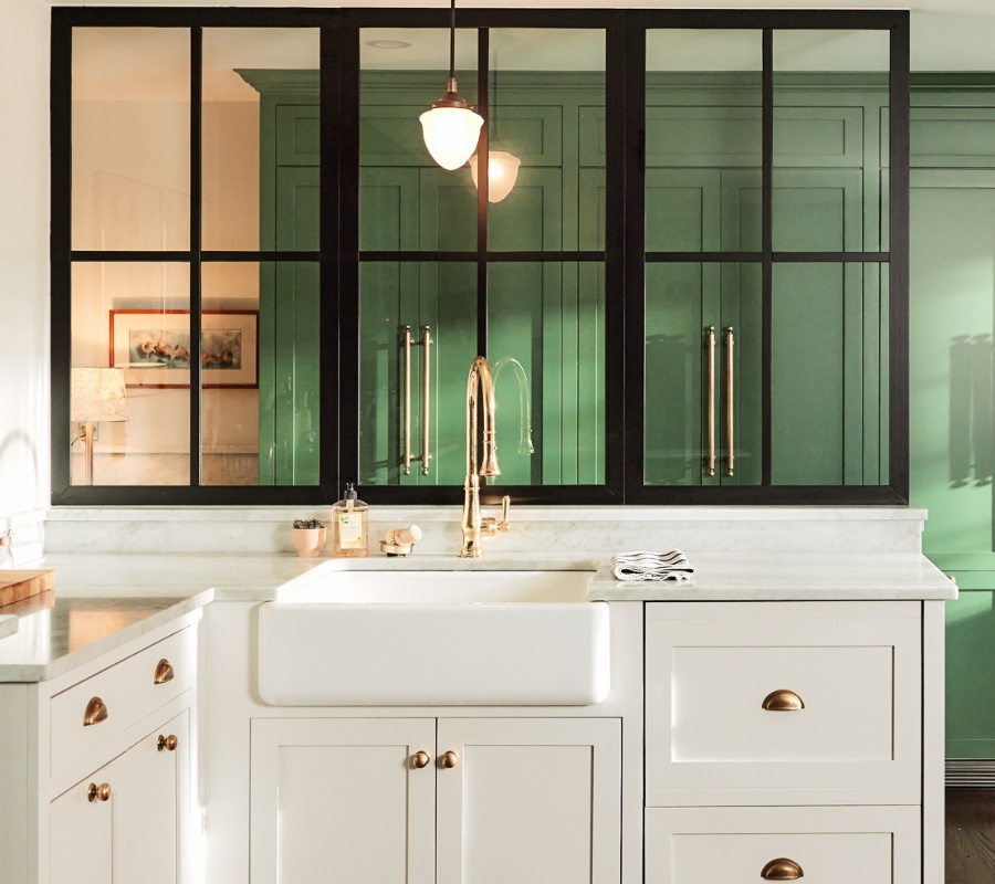 A decorative tile backsplash in the kitchen with clean grout lines.