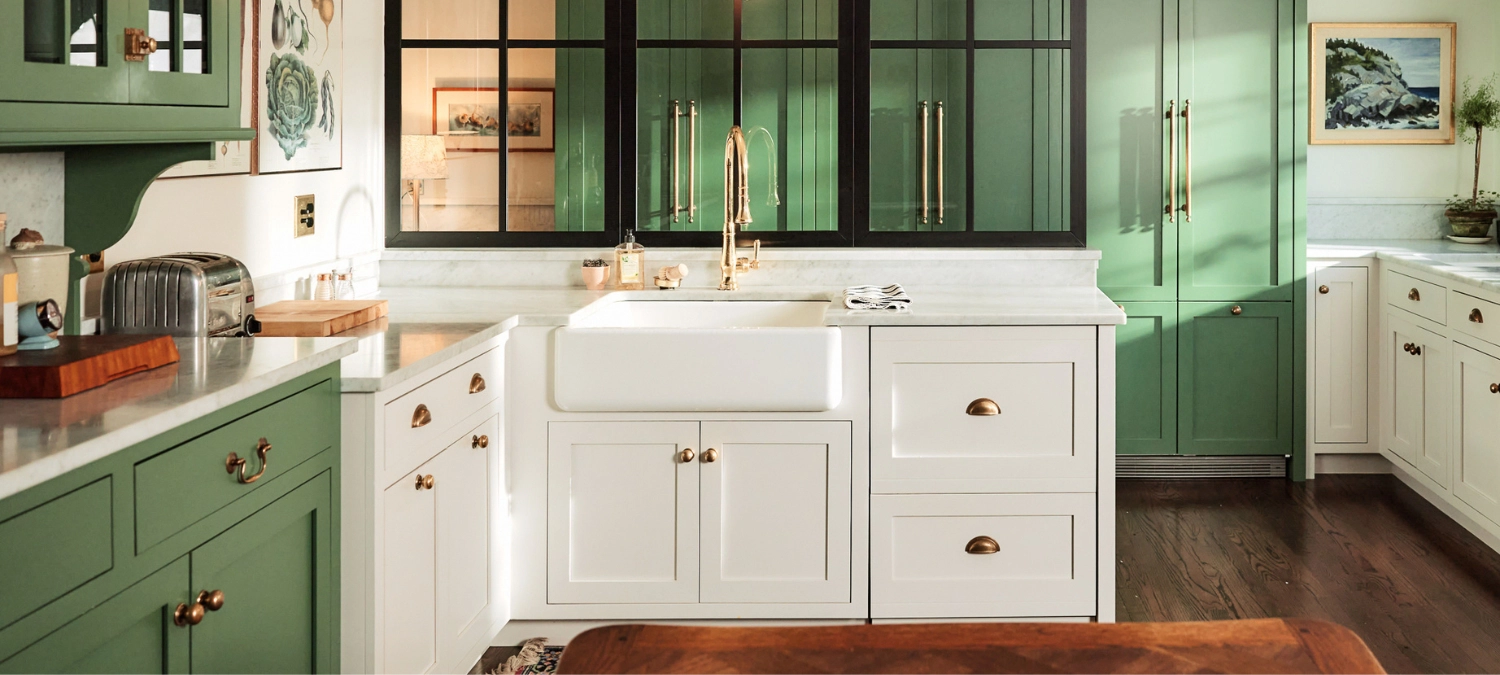 Modern kitchen with under-sink cabinet where moisture and leaks can cause long-term damage if not sealed.