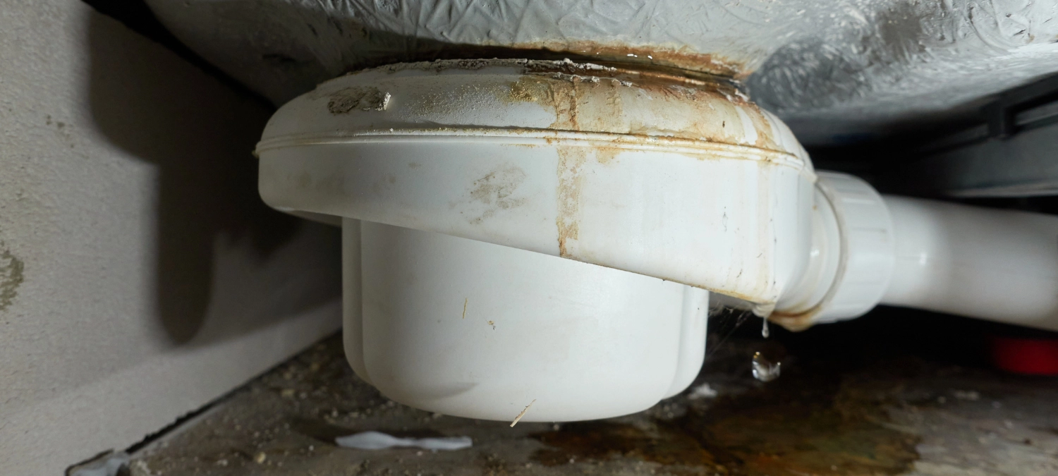 A water leak from a bathroom fixture.
