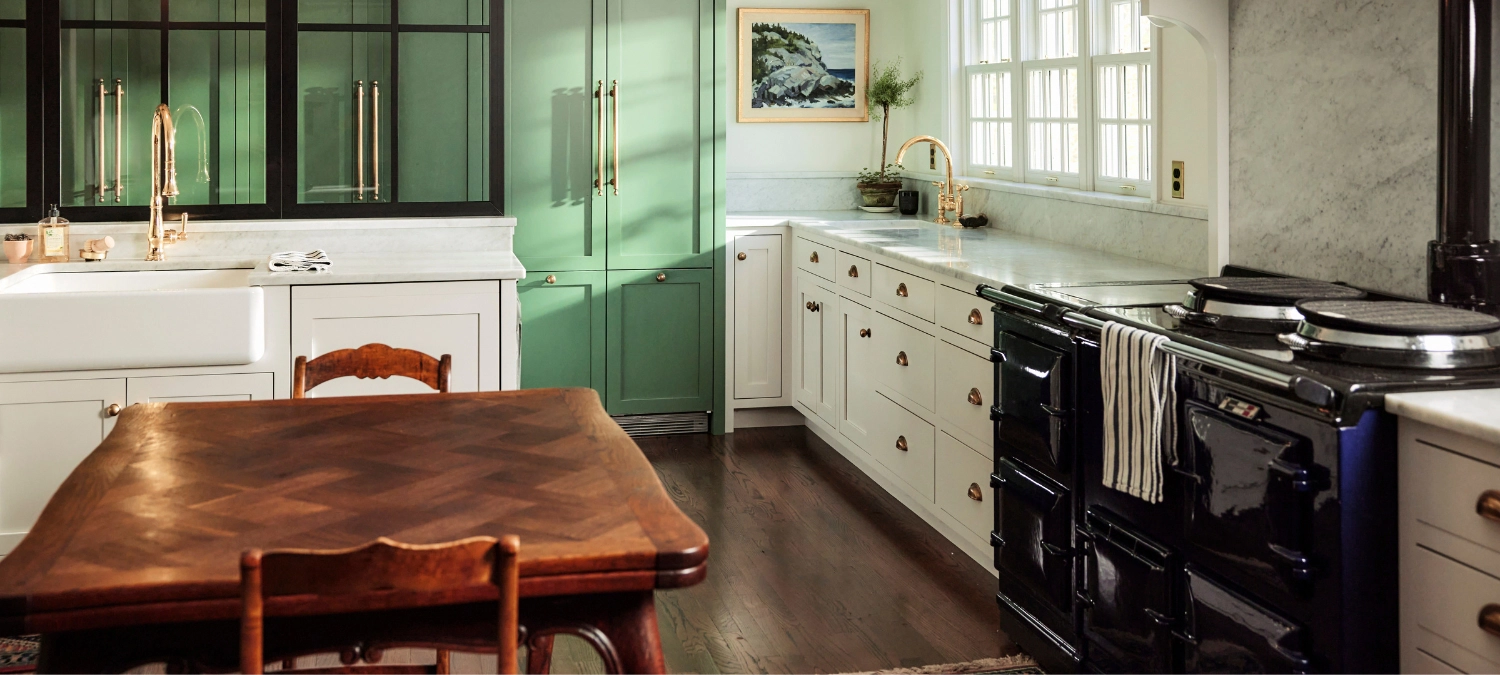 A modern kitchen with visible sealing zones (sink, counter edge, and baseboard trim) that benefit from GE silicone sealant.