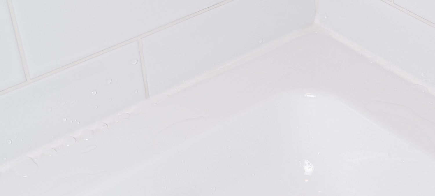Silicone sealant bead finished with GE Sealant Smoothing tool.