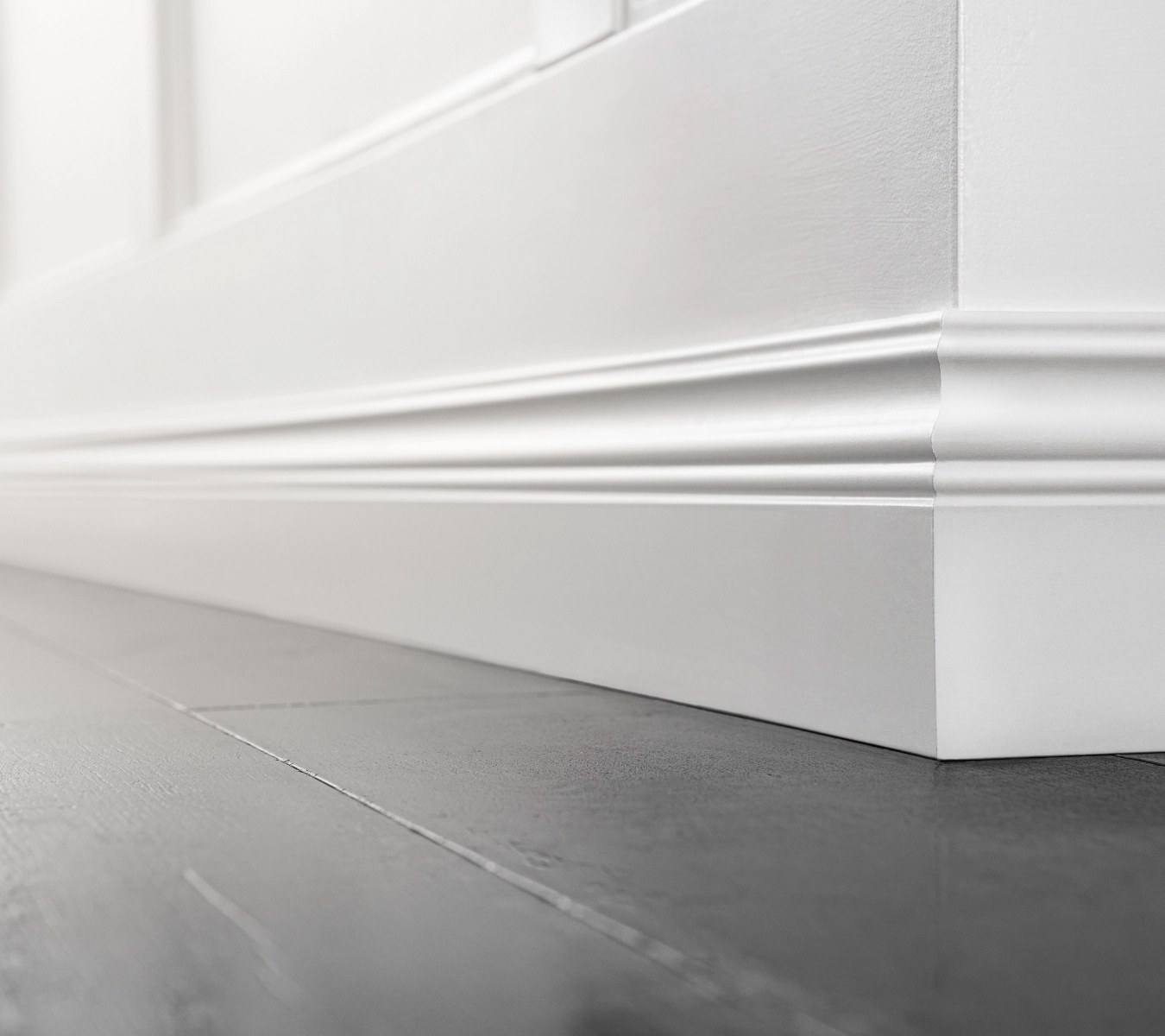 Photo of undamaged baseboard after homeowner learned how to patch trim.