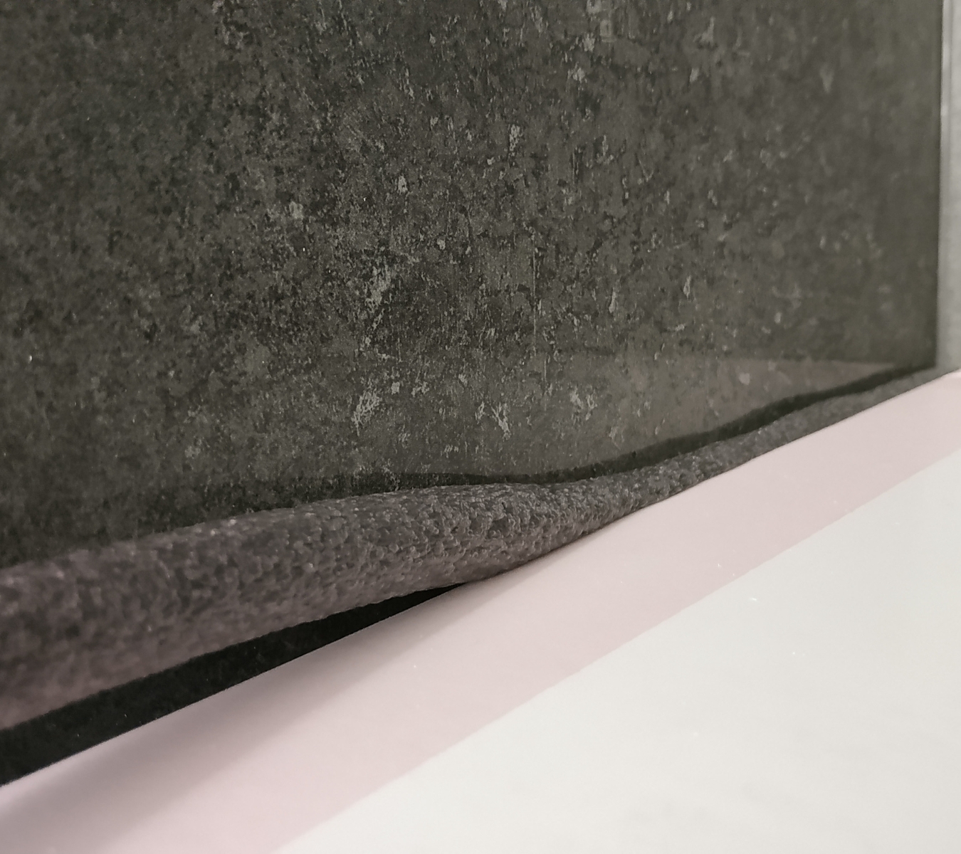 Backer rod installed in a wall joint before applying silicone.