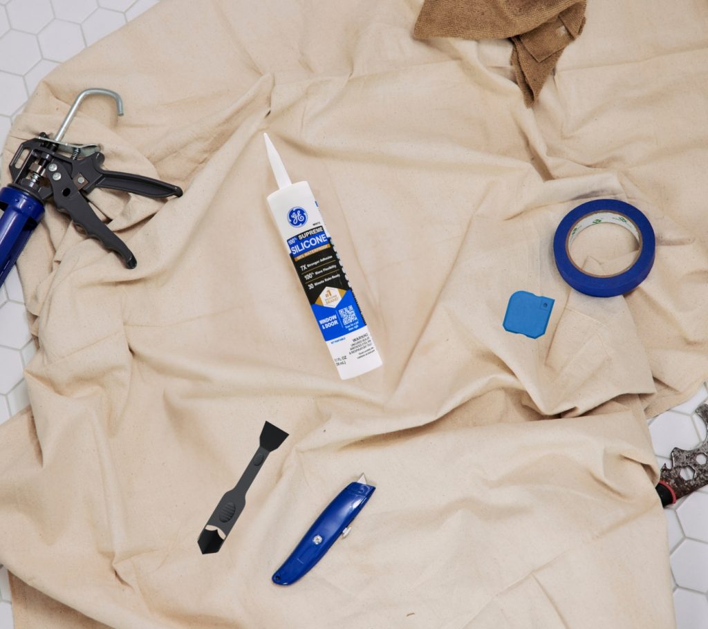 The GE Sealant Remover Tool and Smoothing Tool with a Supreme Silicone Window & Door sealant cartridge.