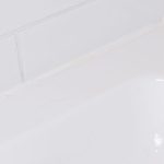 Using silicone sealant to reduce mold, mildew, and grime