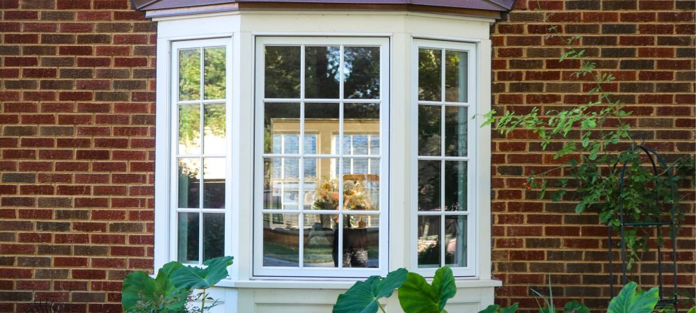 A photo of a window bay on the exterior of a residential home.