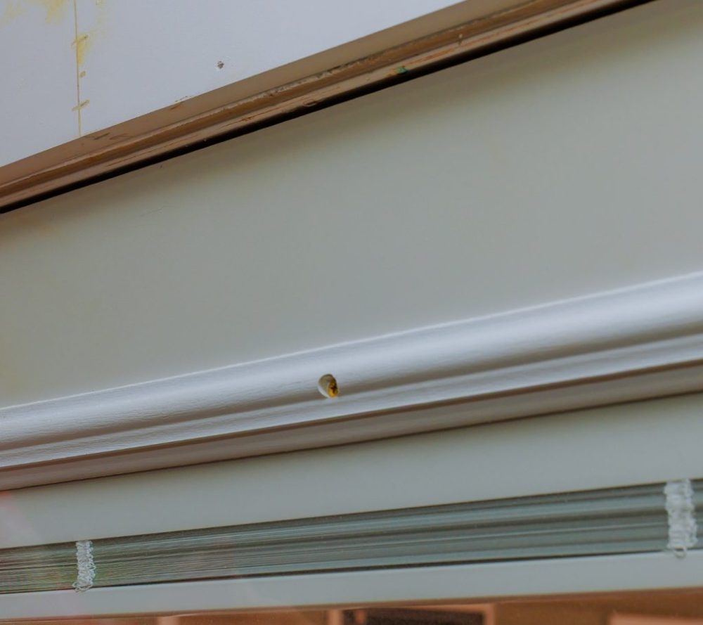 A visible rough gap around a door frame.